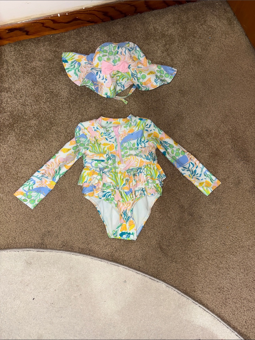 Tommy Bahama ocean themed long sleeved swimsuit with matching hat
